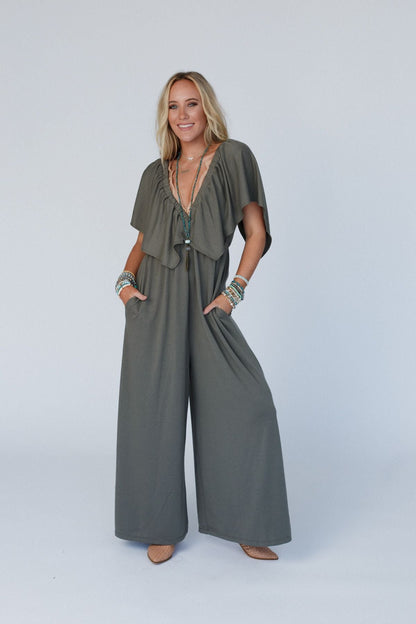 The Nest On Repeat Open Back Ruffle Jumpsuit - Light Olive